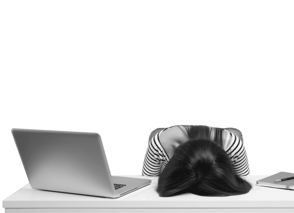 woman with head on desk